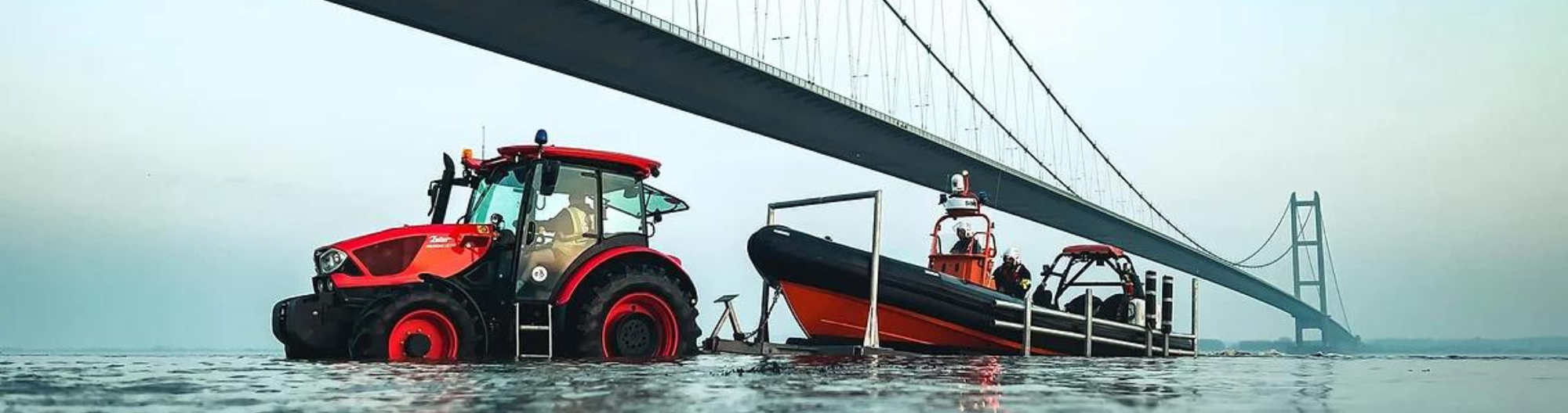Humber Rescue tractor and trailer pictured under the Humber Bridge